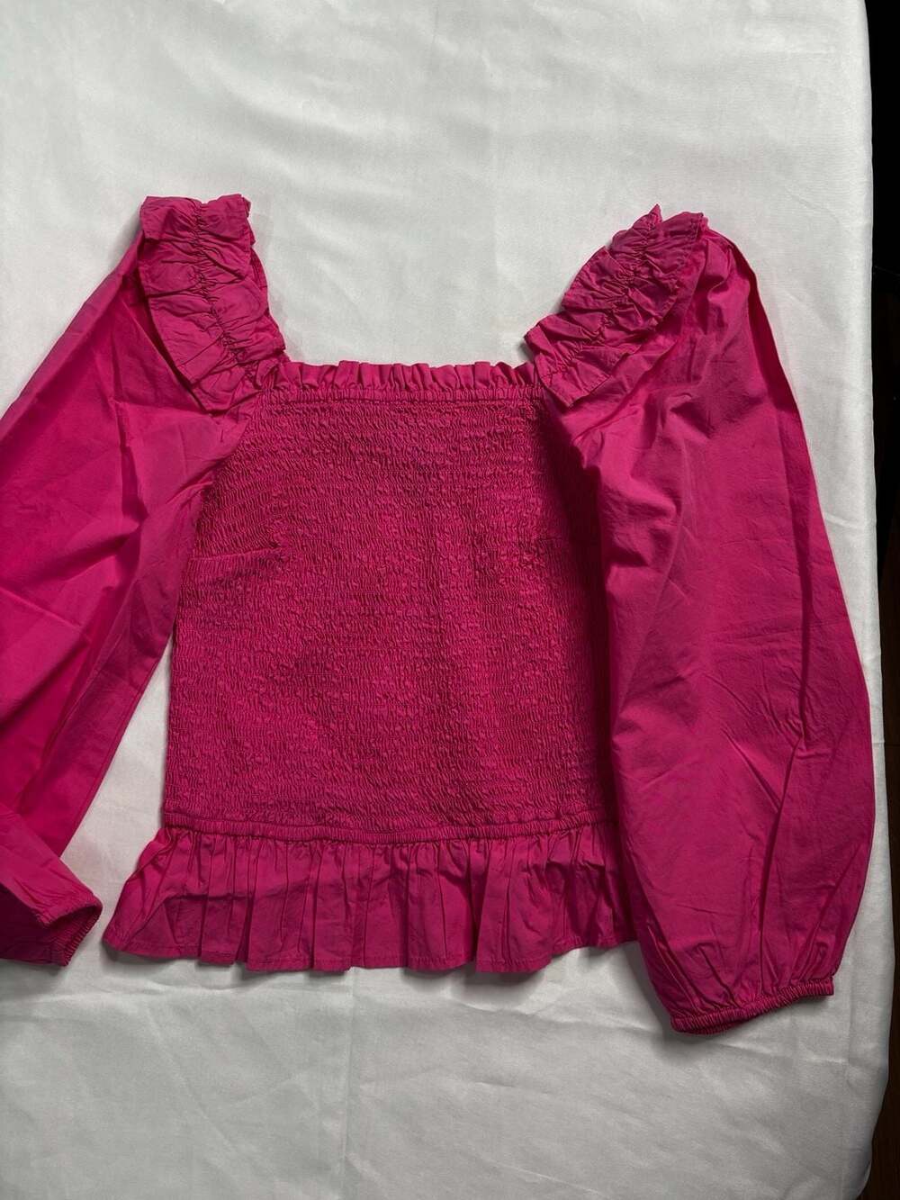The Drop Marisol Smocked Ruffle Long-Sleeve Top in Rose Pink
